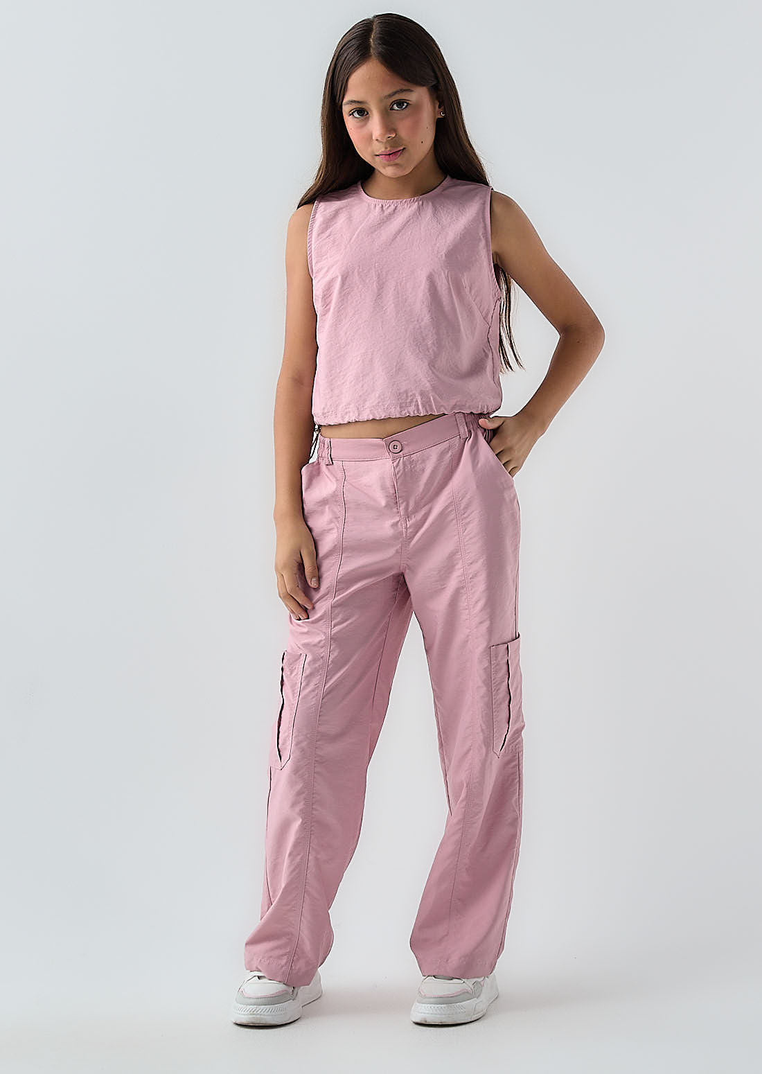 Pantalón palo de rosa con cortes para niñas