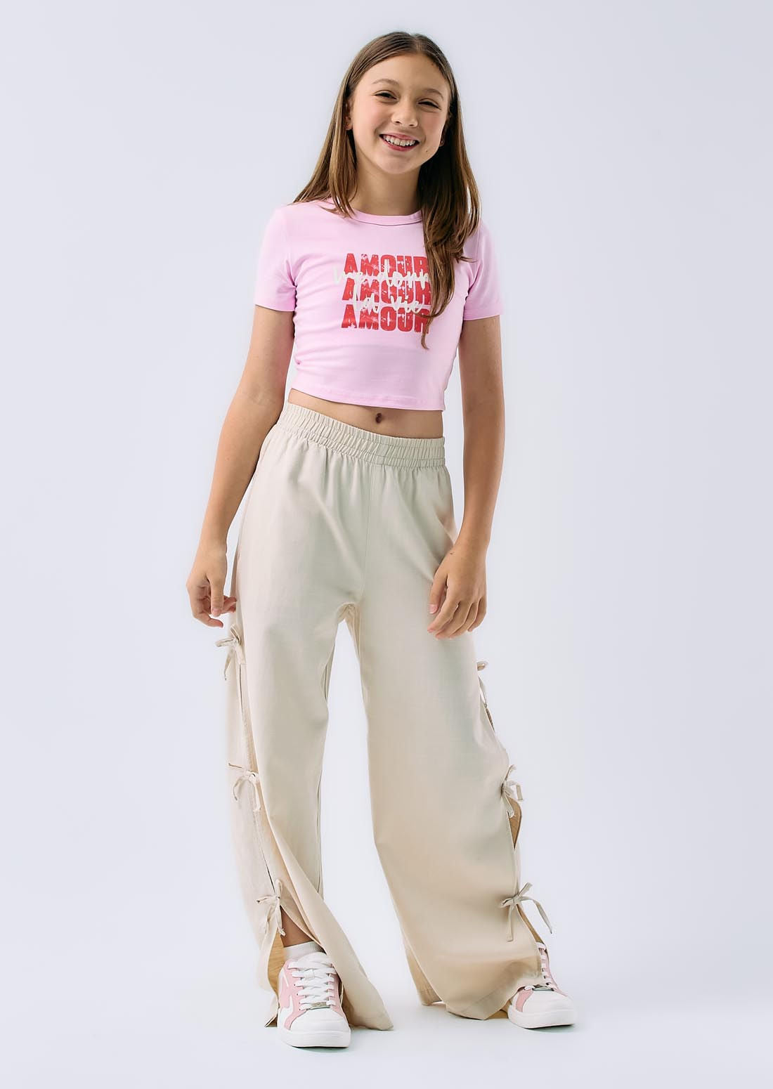 Pantalón arena con moños en costados para niñas